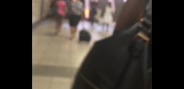  white panties under a white skirt on an escalator.MOV